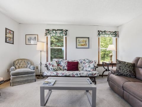 Living Room | Floral Sofa | Natural Light & Garden Views