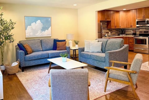 Comfortable gathering space with open living room + kitchen. Seating for seven.