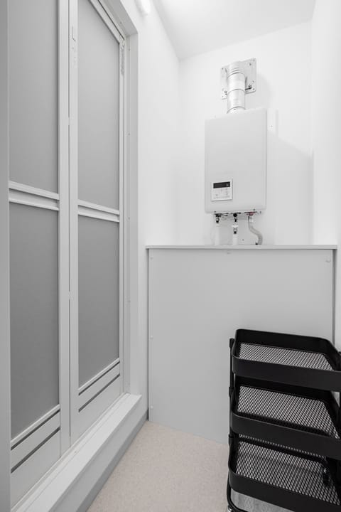 Apartment | Bathroom | Free toiletries, hair dryer, slippers, bidet