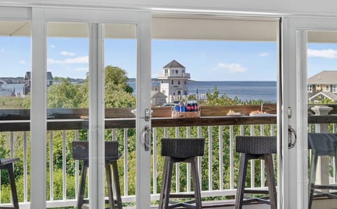 Enjoy ocean views from the private balcony with bar seating.