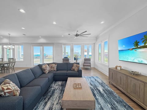 Unwind in the airy living room & stream your favorites on the smart TV​