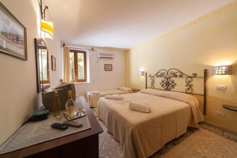 Triple Room | Premium bedding, minibar, in-room safe, desk