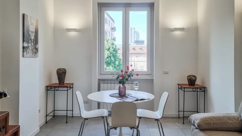 Apartment (2 Bedrooms) | Living area | 32-inch Smart TV with cable channels
