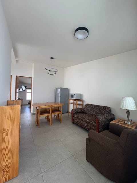 Standard Apartment, 1 Bedroom, Kitchen | Living area | 32-inch flat-screen TV with cable channels, TV