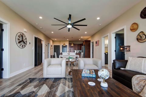 Spacious living room with plenty of room to watch your favorite TV shows and enjoy the panoramic views of Table Rock Lake. 