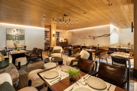 Inside Engelmann's Bistro — counter seating, warm timber finishes, and a locally sourced menu