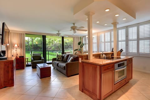 Kitchen With Island And Living Area