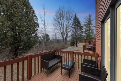Private outdoor deck offering space to relax and enjoy the peaceful alpine surroundings (Cloud)