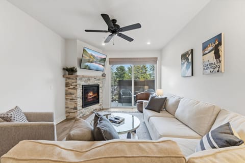 Bright, spacious living room with fireplace, Smart TV and room to unwind