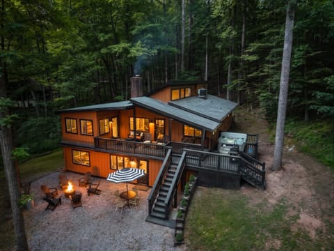Right Mountain Attitude at dusk, with the brand-new hot tub and smokeless fire pit out front