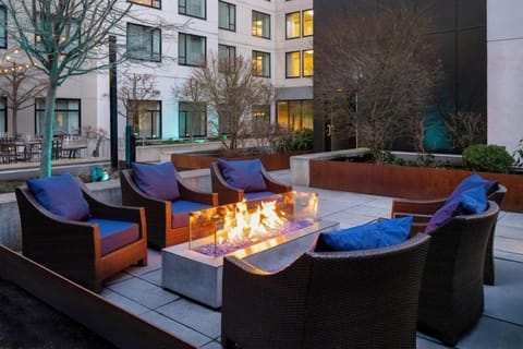 Outdoor patio with cozy fireside seating