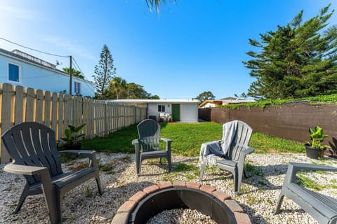 Outdoor backyard space with a fire pit