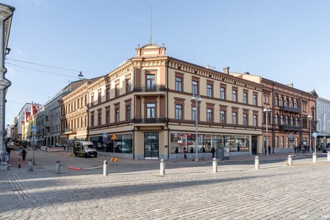Stay in the heart of Tampere at the iconic Sandberg House, where historic charm meets modern city living right on the Central Square.