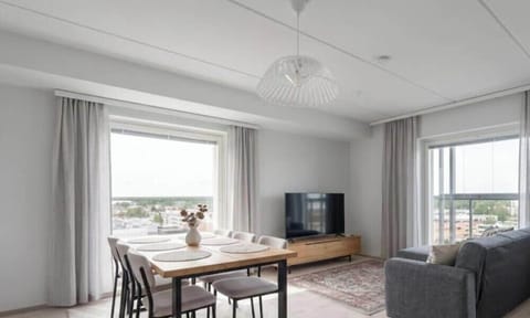Comfort Apartment, 2 Bedrooms, City View | Living area | 55-inch Smart TV with cable channels