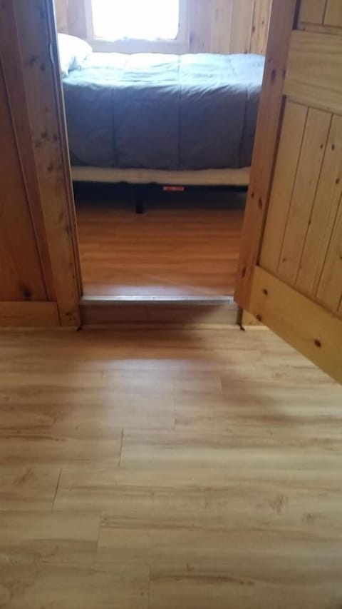 Small steps: into cabin, into living room, and into bedroom