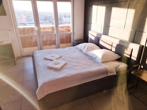 Superior Quadruple Room, City View | Blackout drapes, iron/ironing board (on request), WiFi (free)