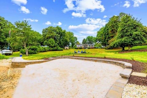 Backyard & Beach - A private sandy beach and clean, deep water make the shoreline the heart of every lake day.