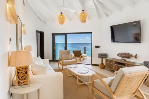 Unwind on plush seating as ocean views steal the show.