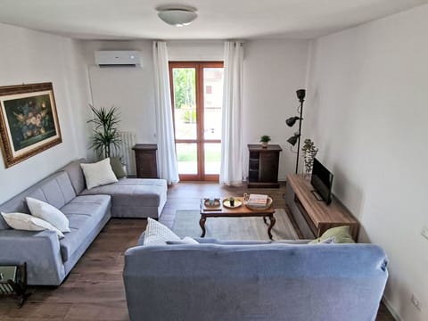 Furniture, Interior Design, Flooring, Couch, Wood, Floor, Living Room, Room, Table, Lighting