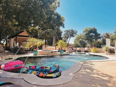 Step into your own private resort!  Our spacious backyard is designed for total 