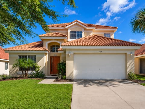 Spacious two-story home with tropical feel and two-car garage