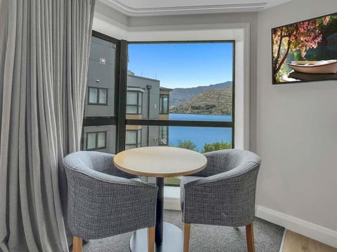 Dining nook with lake and mountain views