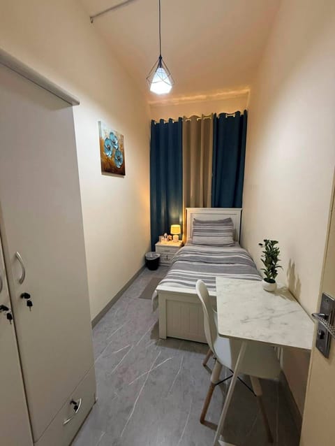 Comfort Single Room, Non Smoking, Shared Bathroom | Down comforters, blackout drapes, iron/ironing board (on request)