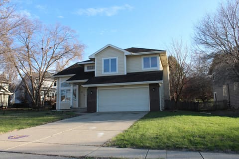Modern two-story home with 2-car garage on a quiet street