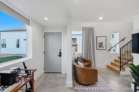 A stylish living space with designer finishes and a smart TV for movie nights and game day. Plenty of room to spread out and settle in.
