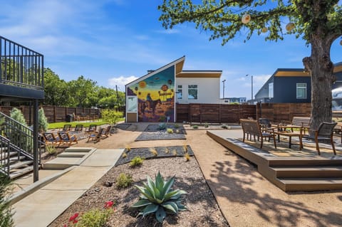 The hidden courtyard at the heart of the property, full of character and space to gather. Private when you want it, social when you don't.
