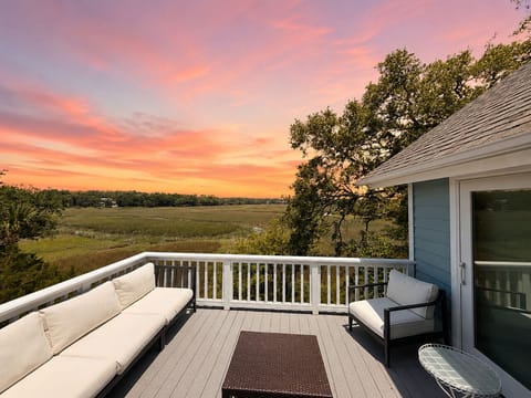 Stunning sunset views over the Lowcountry tidal marsh from the spacious second-floor outdoor deck.