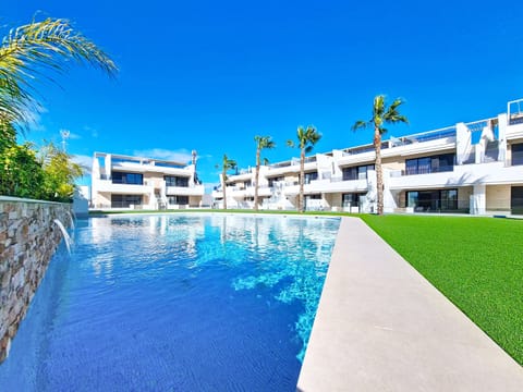 Modern penthouse apartment at La Llana Beach, Mar de Cristal with rooftop terrace and communal swimming pool.