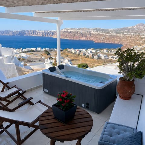 Private outdoor hot tub with panoramic sea views