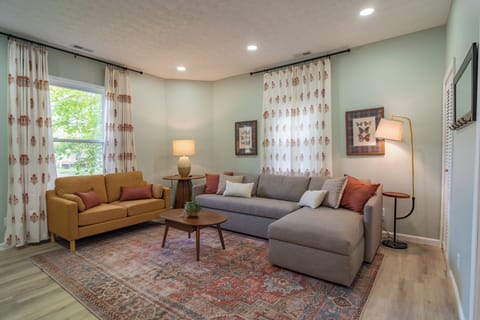 Relax in a comfortable living room after a long day of exploring the area.