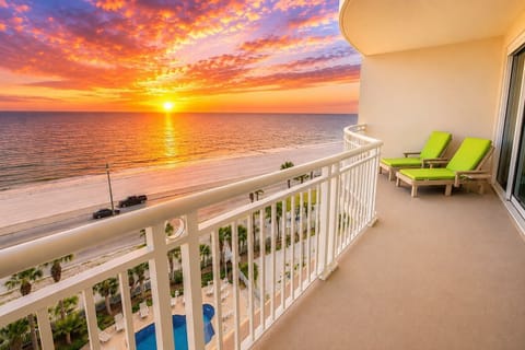 Private Gulf-Front Balcony - Expansive Gulf-front balcony with comfortable lounge chairs, making it the perfect place to enjoy breathtaking sunrises and panoramic water views.