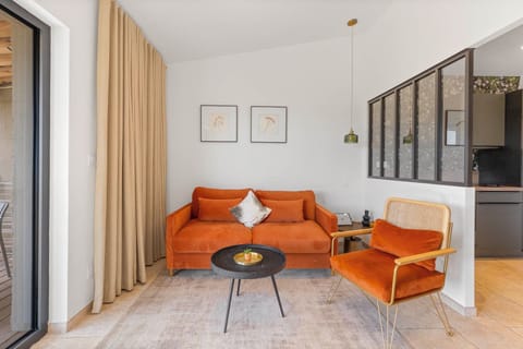 Apartment, 1 Bedroom, Partial Sea View | Premium bedding, in-room safe, individually decorated