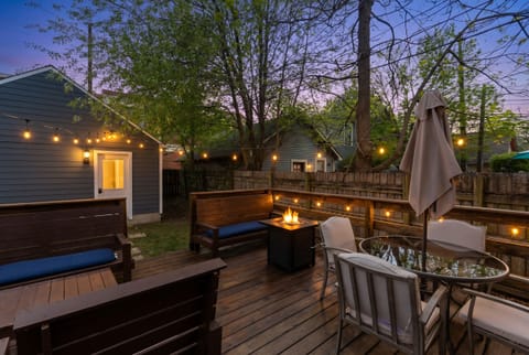 Cozy patio with enough seating for all. A grill and a fire pit is also provided 