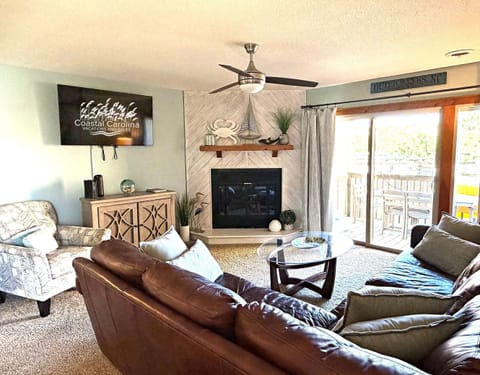QE6: OBXCITEMENT | ML Living Area - Deck Access