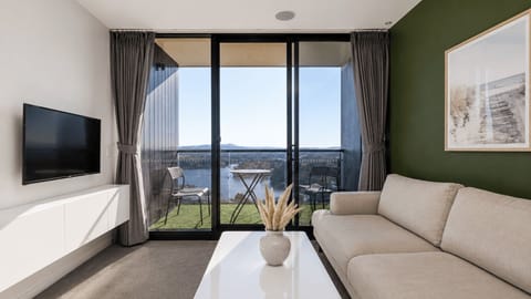 Relax with a smart TV and panoramic outlook from the sofa.