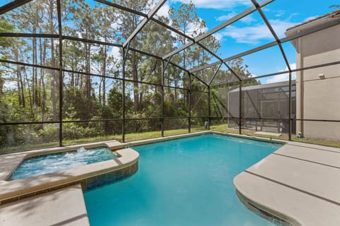 Resort-style screened pool perfect for relaxing afternoons.