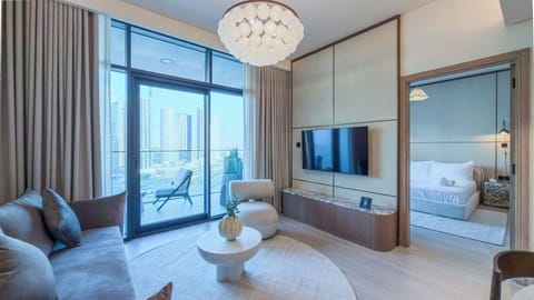 Deluxe Apartment, Balcony, City View | Living area | 55-inch Smart TV with digital channels