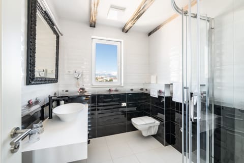 Shower, free toiletries, hair dryer, bathrobes