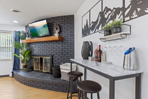 50-inch Smart TV with digital channels, fireplace, foosball