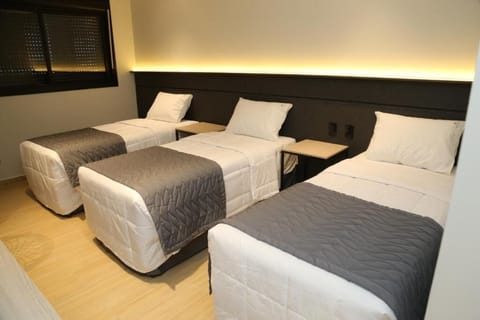 Standard Triple Room, City View | Desk, laptop workspace, WiFi (free)