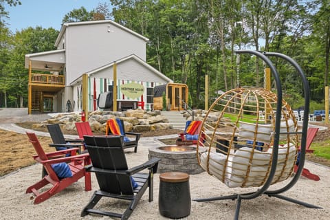 Welcome to Heritage House, a luxurious Poconos chalet with a backyard oasis.