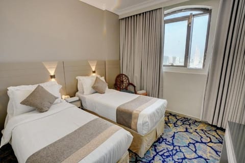 Deluxe Double or Twin Room | Minibar, WiFi (free), bed sheets