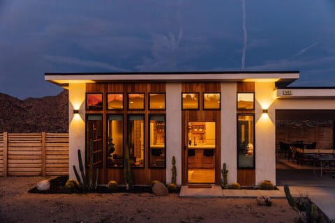 Modern desert curb appeal, glowing at golden hour