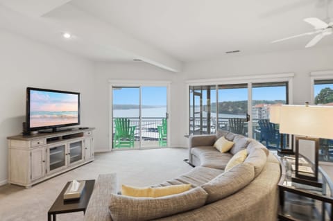 Spacious living room with breathtaking main channel views and direct access to the private lakeview balcony.
