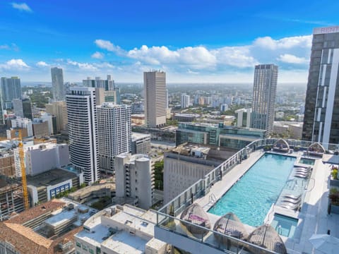Lounge the day away or make a splash at the sparkling rooftop pool​