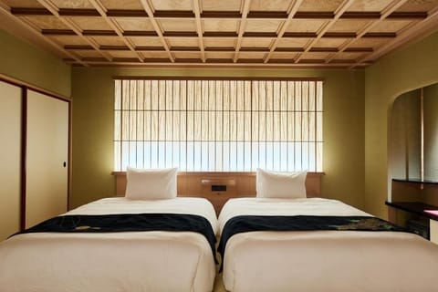 Triple Room, Garden View | Minibar (free items), in-room safe, WiFi (free), bed sheets